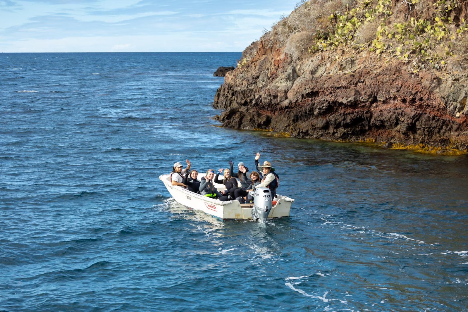  marine biology students in a boat
